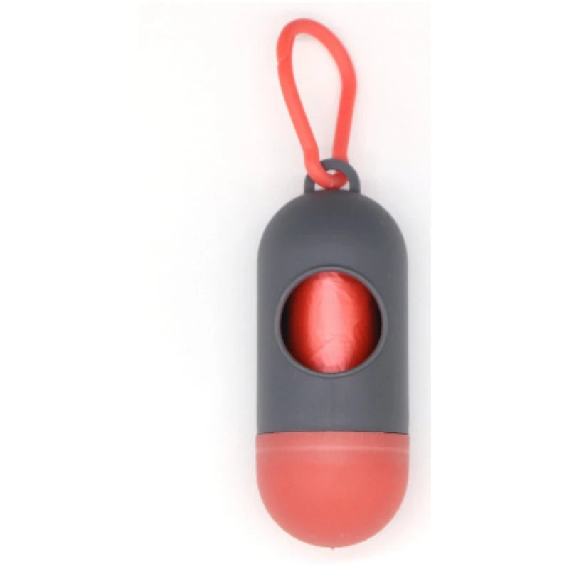 Dispensador Portátil de Bolsas para Popó – Diseño Tipo Cápsula con Gancho para Perros y Gatos