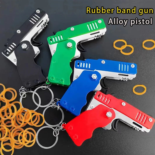 Mini Lanzador de Ligas con Llavero – Juguete Portátil con 60 Ligas, Regalo Divertido para Niños y Adultos